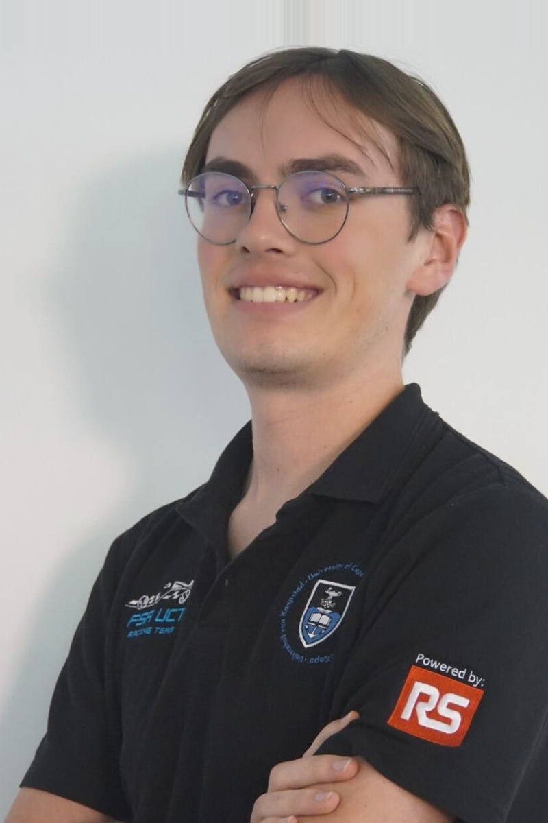 Matthew Shackleton, wearing round glasses and a black UCT Racing team polo.